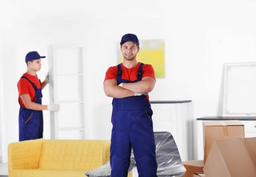 Office furniture and packed equipment ready for commercial removals