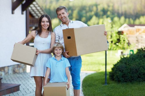 Unpacking service helping a family settle into a new Epsom home