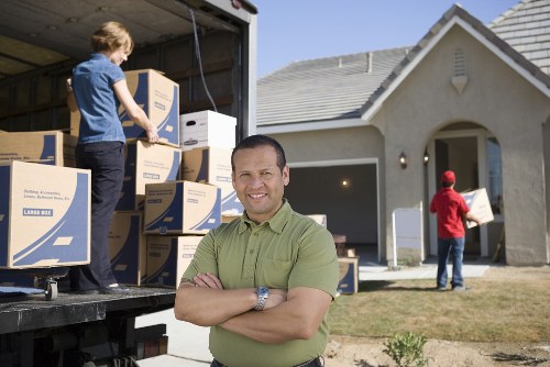 Packed boxes and furniture ready for local removals