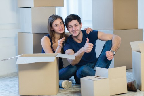 Loading furniture into a local removal van for an Epsom move