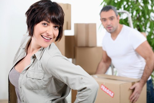 Loading furniture and boxes into a removals van in Epsom