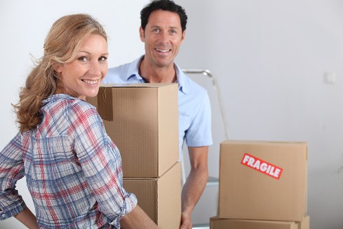 Packing boxes and loading a van for an Epsom move
