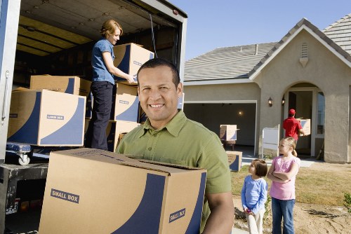 Moving van and household items being loaded for a local Epsom move