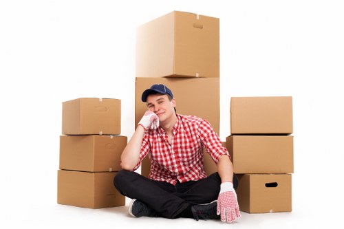 Packed boxes and household items prepared for collection in Epsom
